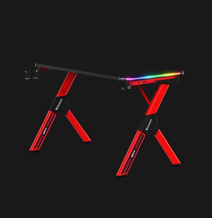 DAEDALUS M2 is an RGB gaming desk that features a carbon fiber surface, an innovative structural design, and RGB streaming lights on both wings of the table to enhance your gaming experience. • Cable Management • Carbon Fiber Surface • Cup Holder / Headset Holder • Power Strip Holder • Remote Control • Steel Frame Construction • Two RGB Light Strips